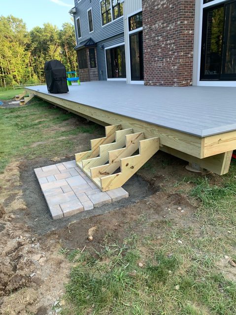 Composite deck and outdoor living space