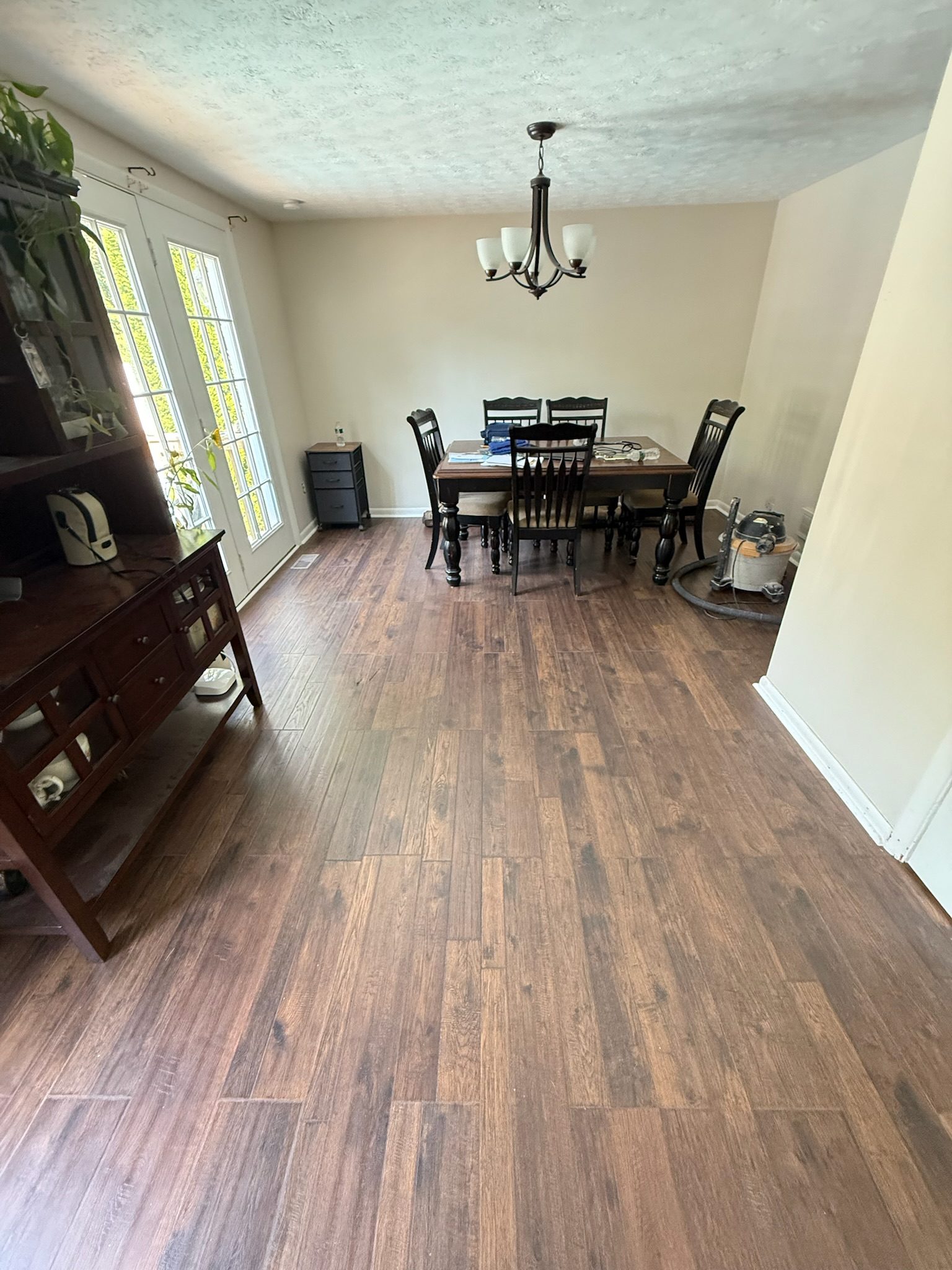 Remodeled dining room with new flooring