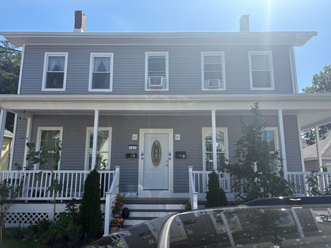 Completed two-tone gray siding on a Connecticut home