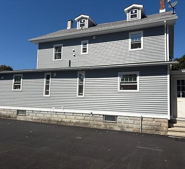 New siding on a large two-story Connecticut home